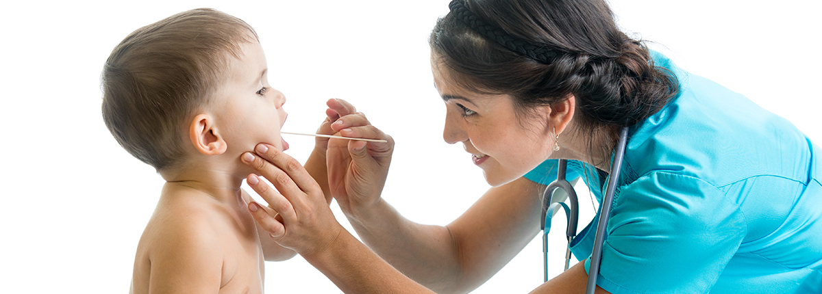 Nurse examines child