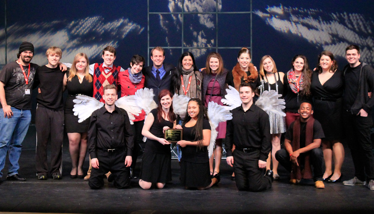 Theatre students displaying an award