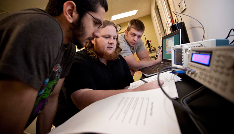 Physics students collaborating