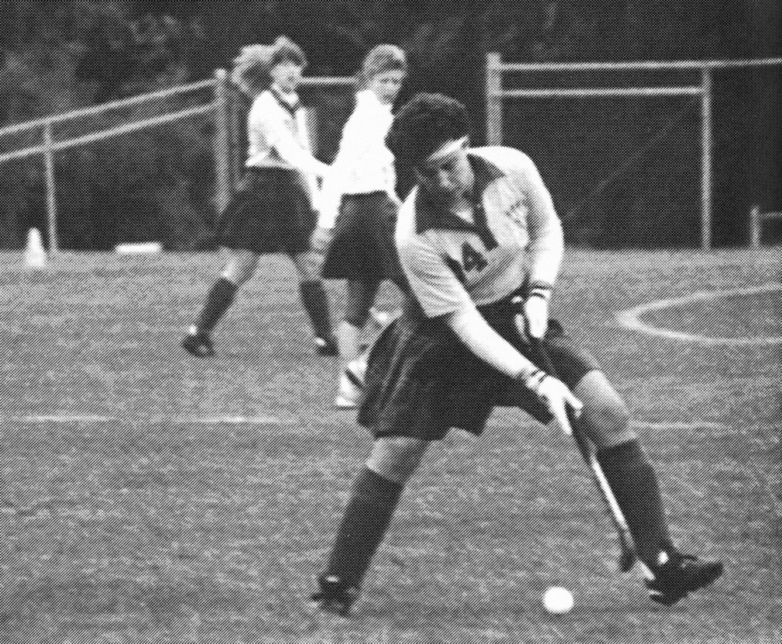 Beck playing field hockey in 1989