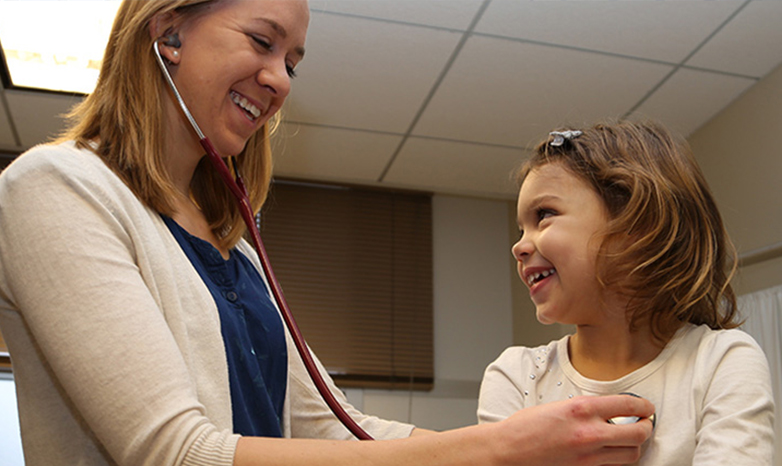physicians assistant and child patient