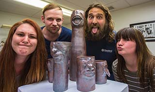 Chelsey Werner, Travis Sallack, Anthony DeRosa and Nikki Westfield , members of the SRU Art Society, spearheaded the initiative to open the SRSGA Student Art Gallery.