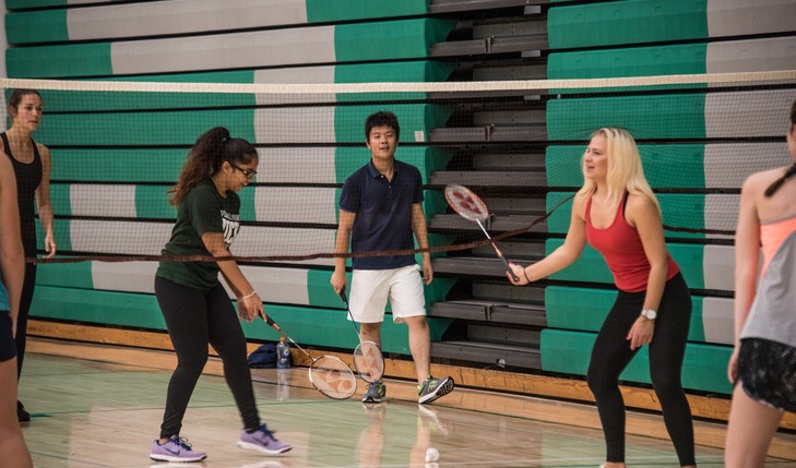 students playing badminton