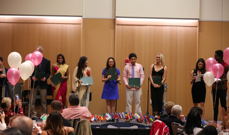 students presenting awards