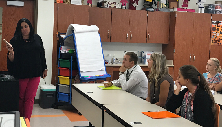 Traci Valentino, principal at Case Avenue Elementary in Sharon, speaks with Slippery Rock University elementary education/early childhood majors, Sept. 26, as part of SRU’s partnership with the Sharon City School District. 
