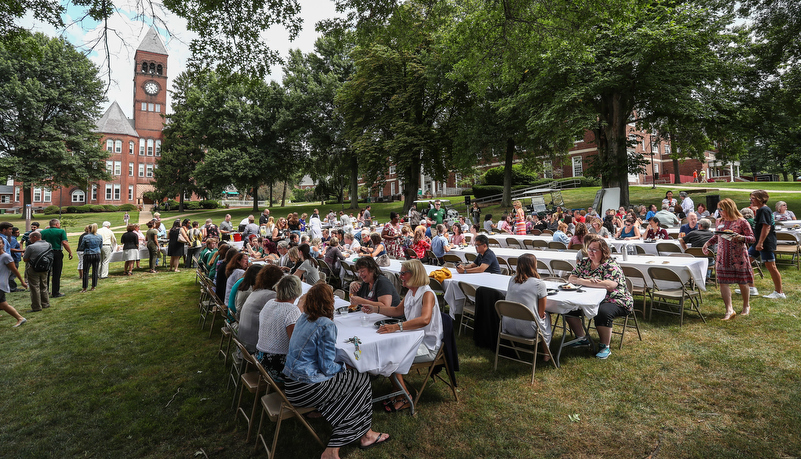 Staff and faculty enjoy a meal
