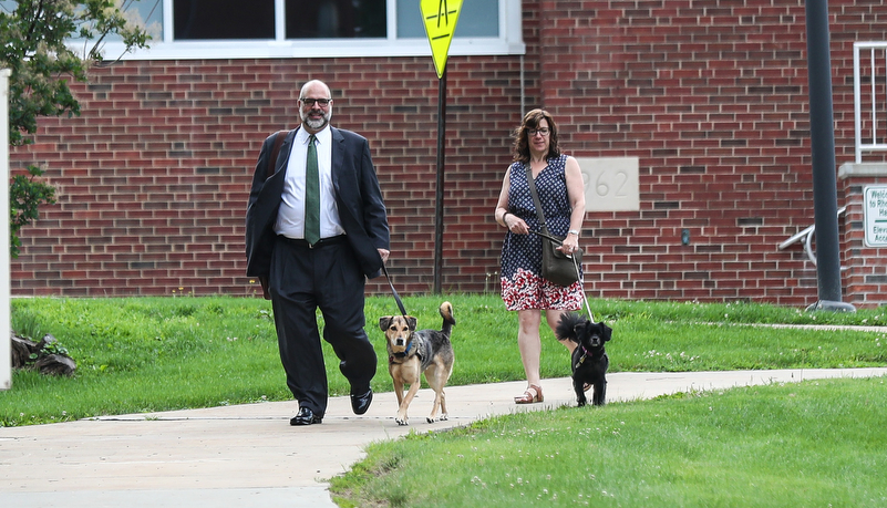 President Behre and his wife Leah walking their dogs