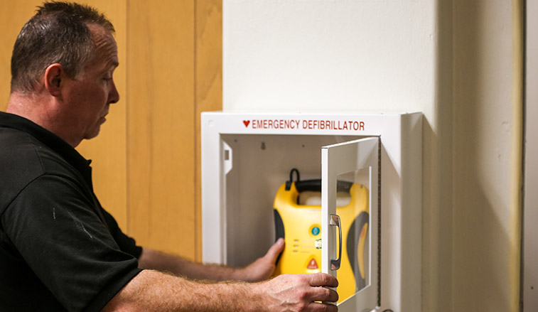 AED box being installed