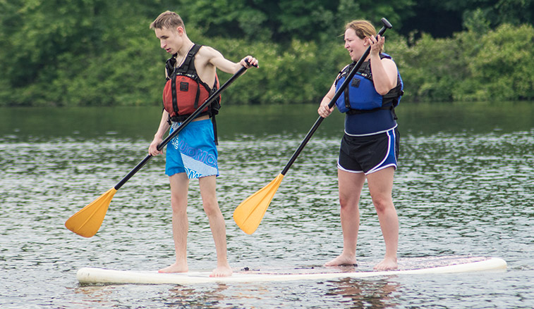 Students on a paddle board