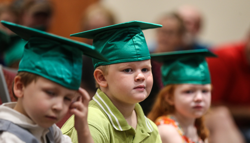 Pre-school graduates waiting to graduate