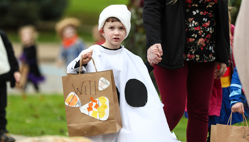 Boy dressed in a ghost costume 