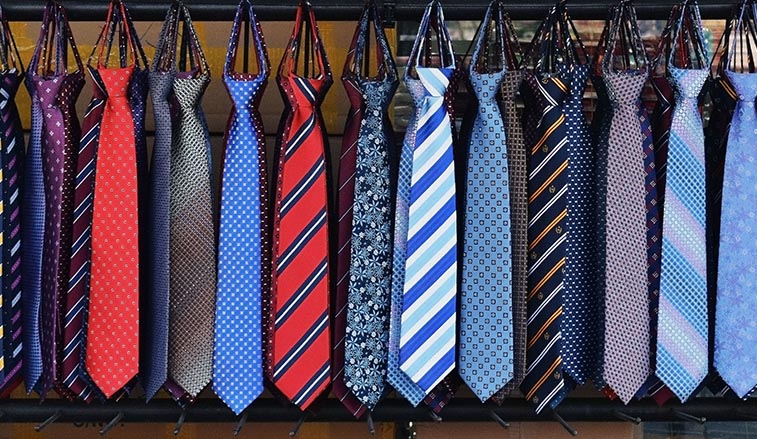 Neckties hanging on a rod