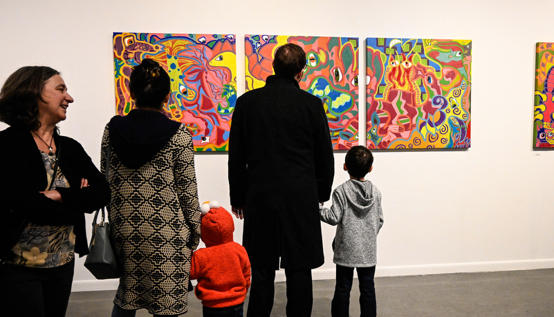 a family looking at art